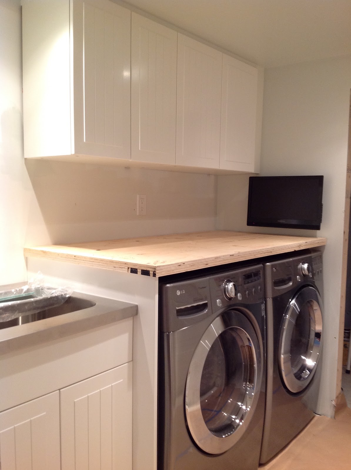 how to build a countertop above washer and dryer
 How To Support A Laundry Room Countertop Over A Washer And ..